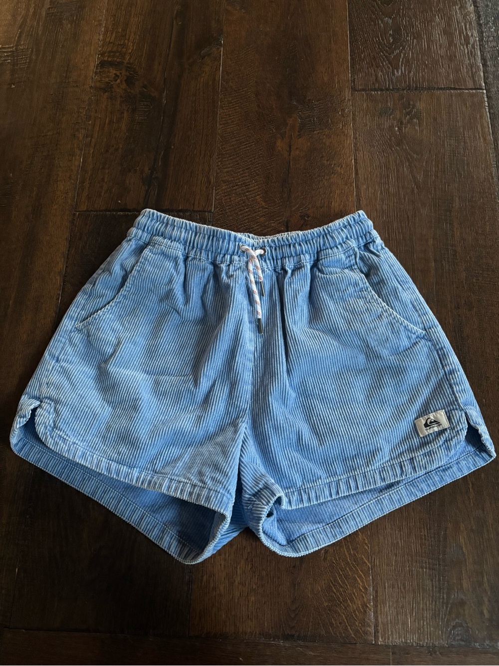Quiksilver light blue corduroy shorts dolphin hem and drawstring tie, size XS